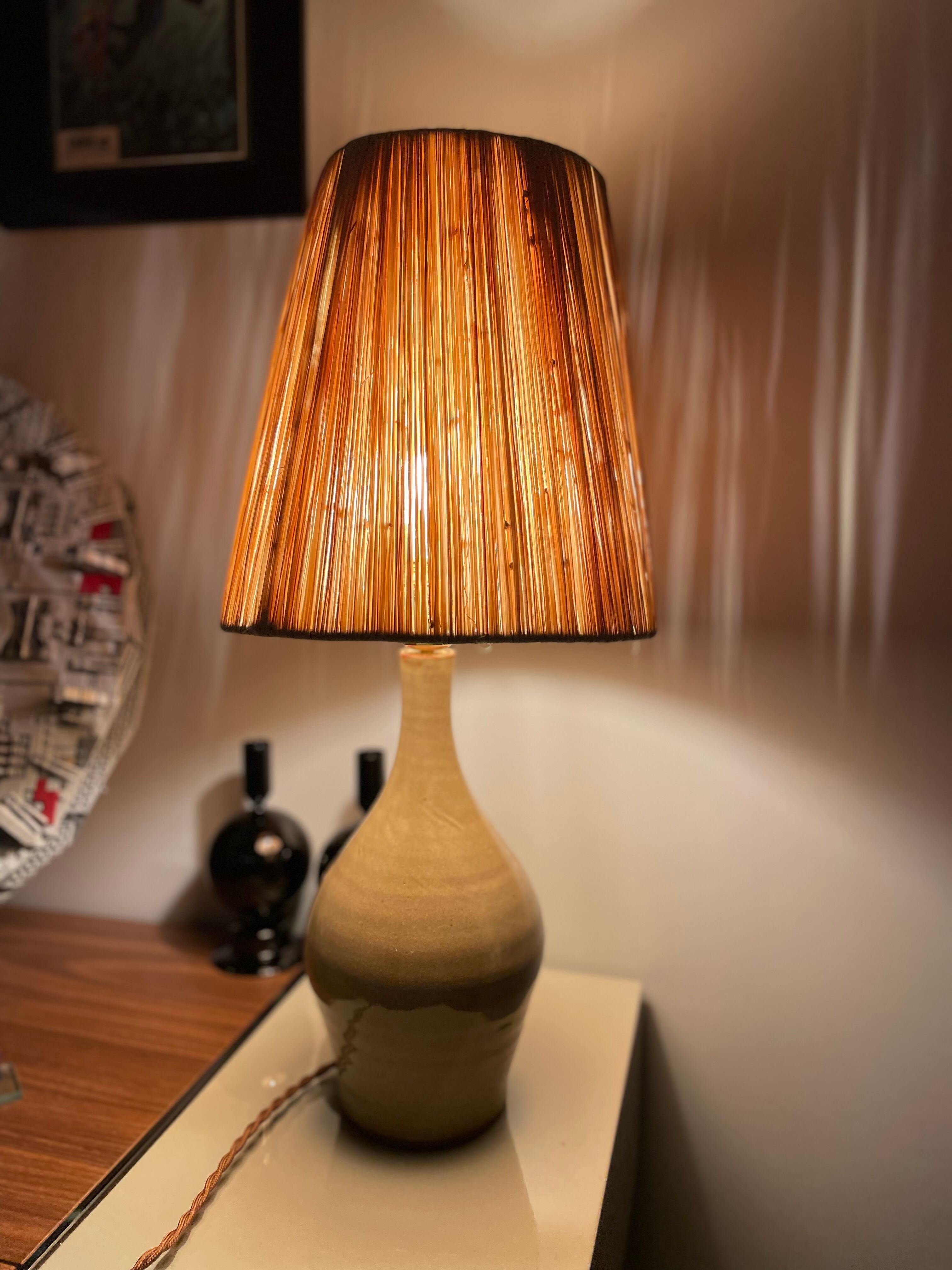 Lamp in stoneware and raffia electrified to nine