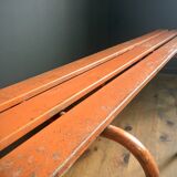 Old orange metal bench