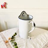 Old medical fountain in white enameled sheet metal