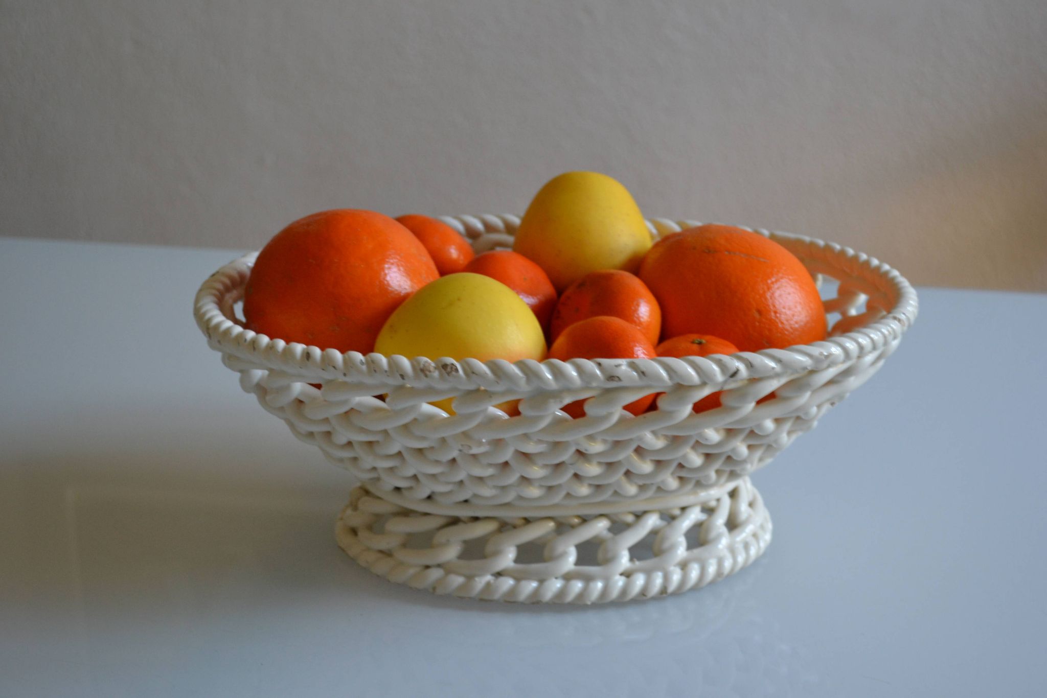 Woven ceramic oval fruit bowl or dish