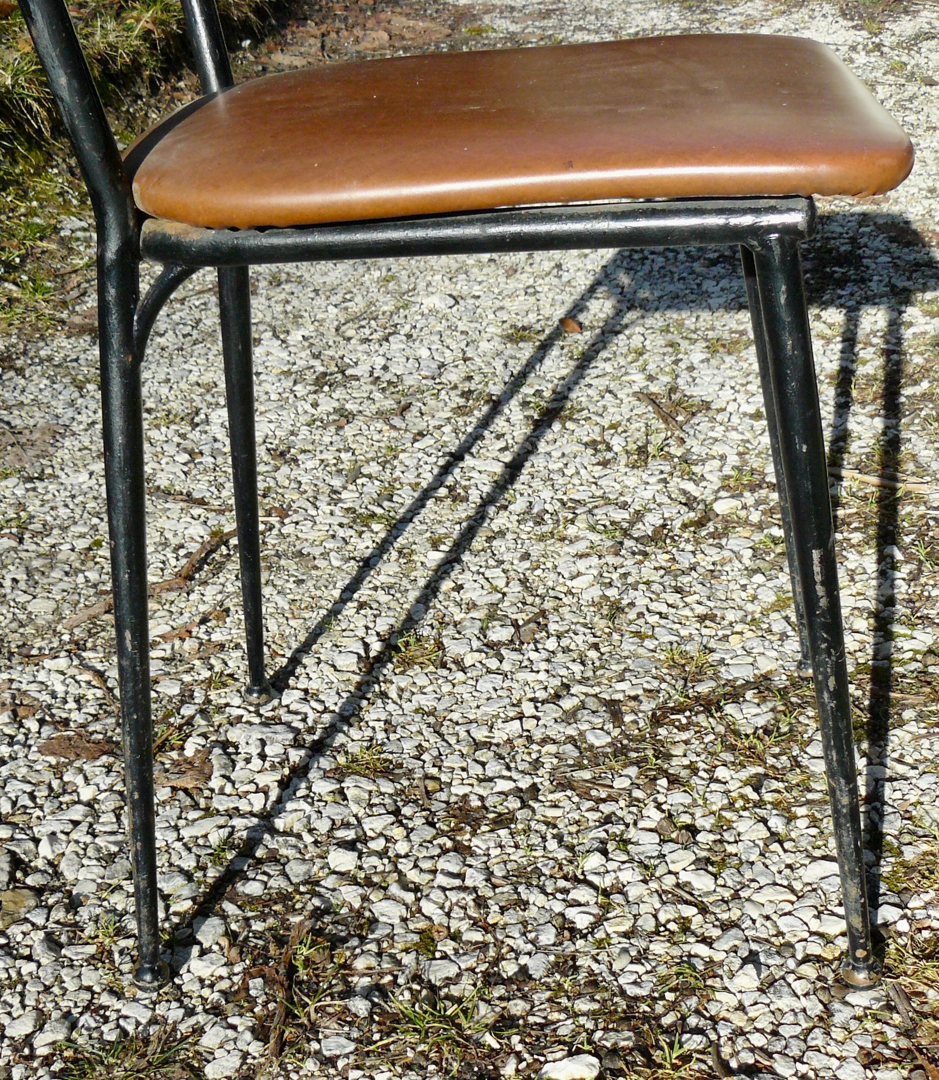 Pair of metal and imitation leather chairs 1950
