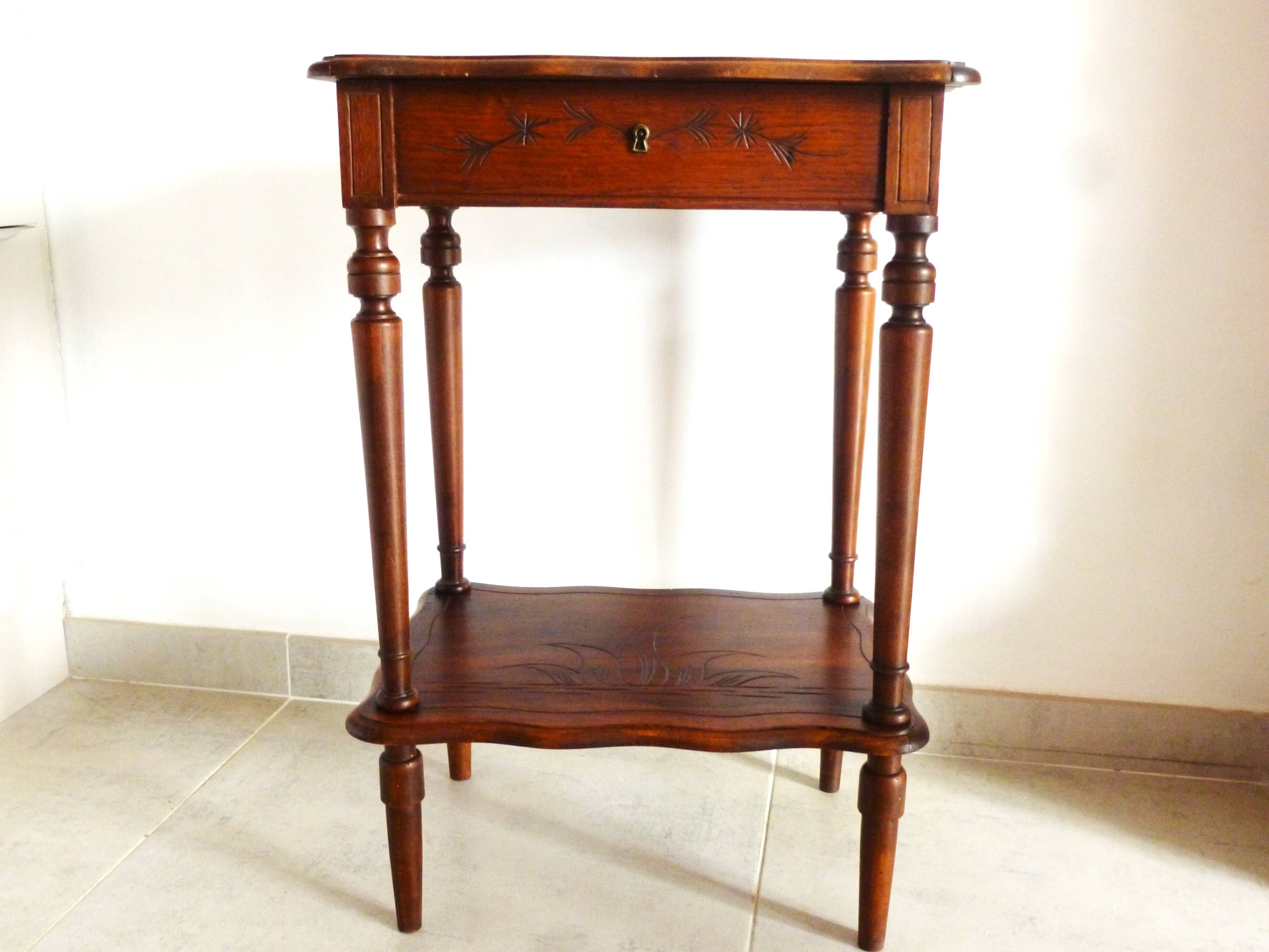 Vintage 1920s wooden dressing table with mirror and storage.