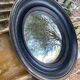 Convex mirror, also known as a witch's mirror.