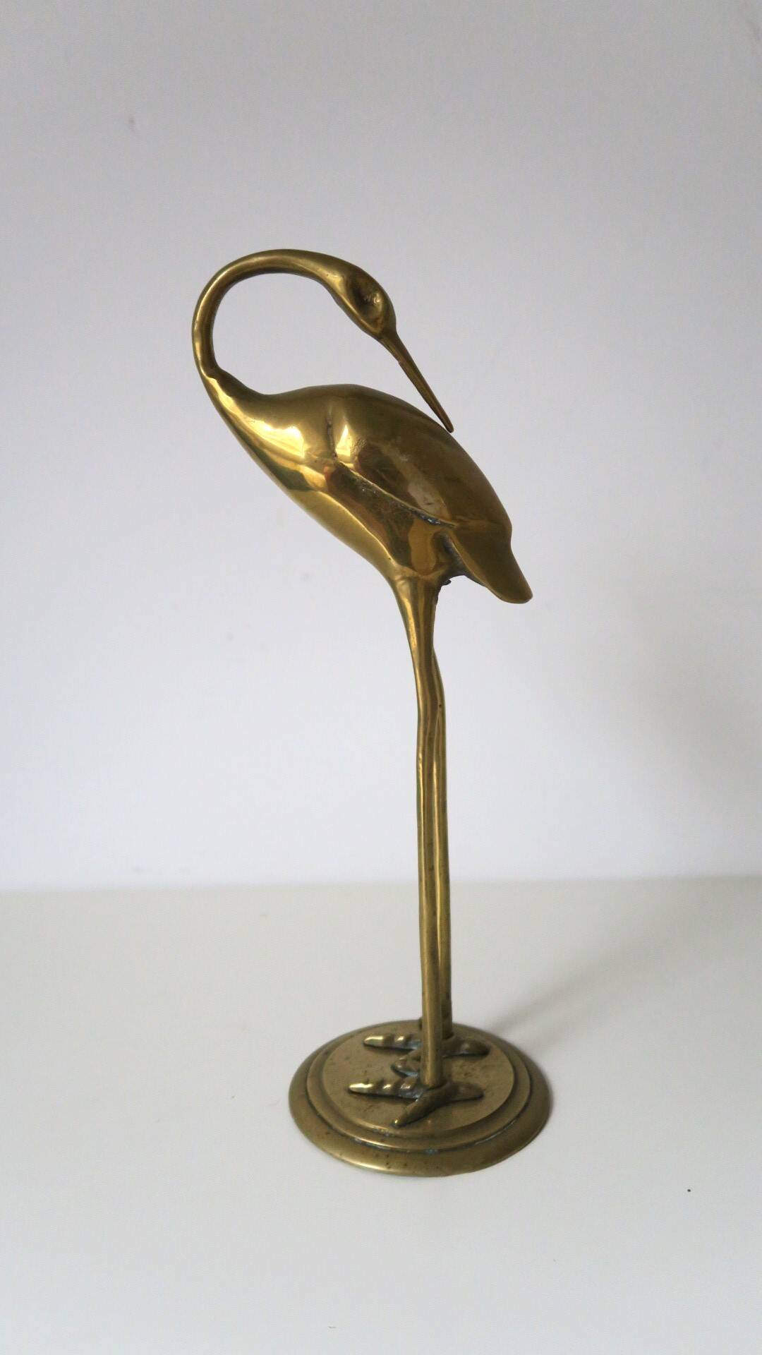The decorative brass bird