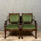 Pair of Empire-Consulate armchairs in molded and carved mahogany