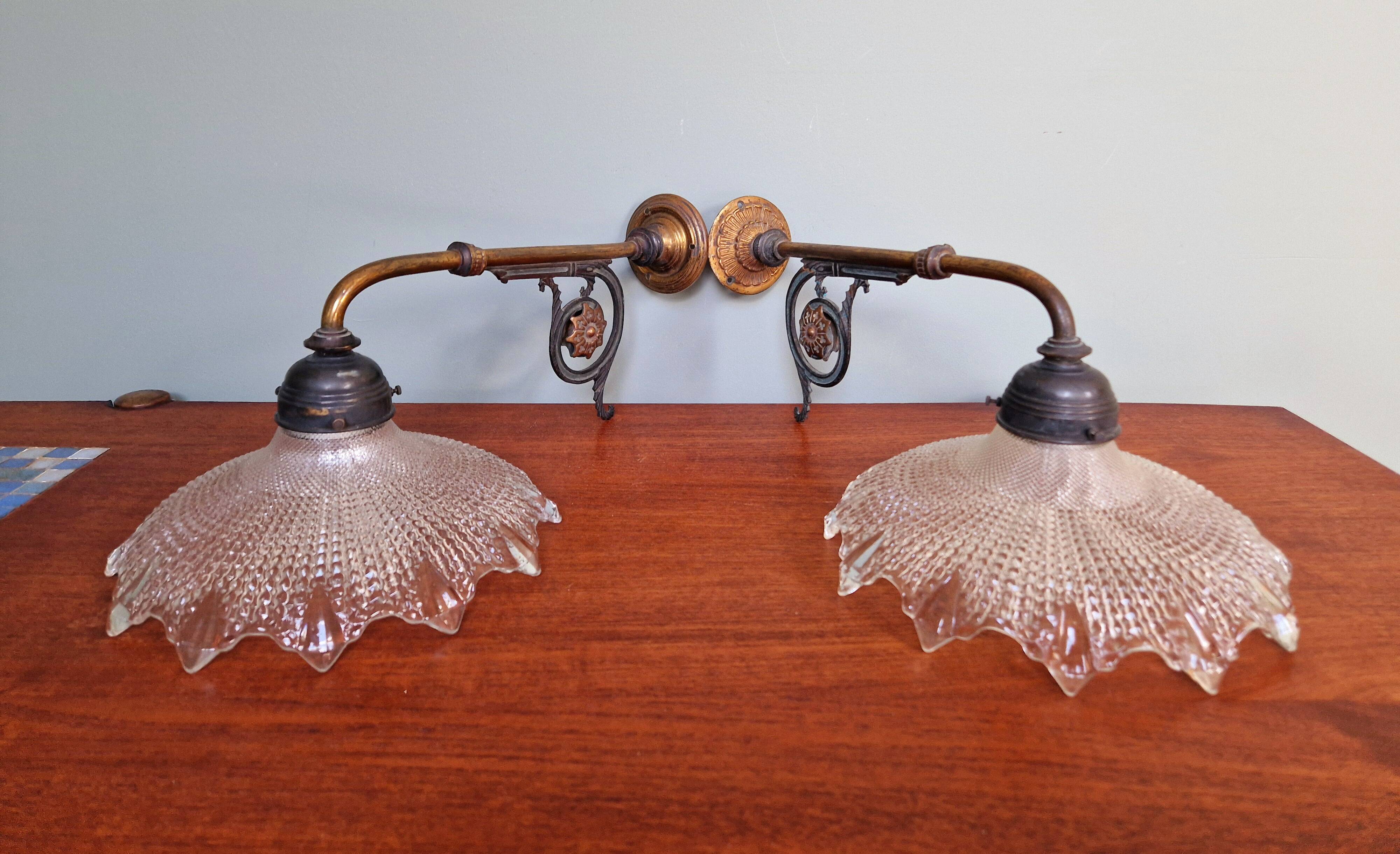 Pair of pendant lights in bronze and scalloped transparent glass