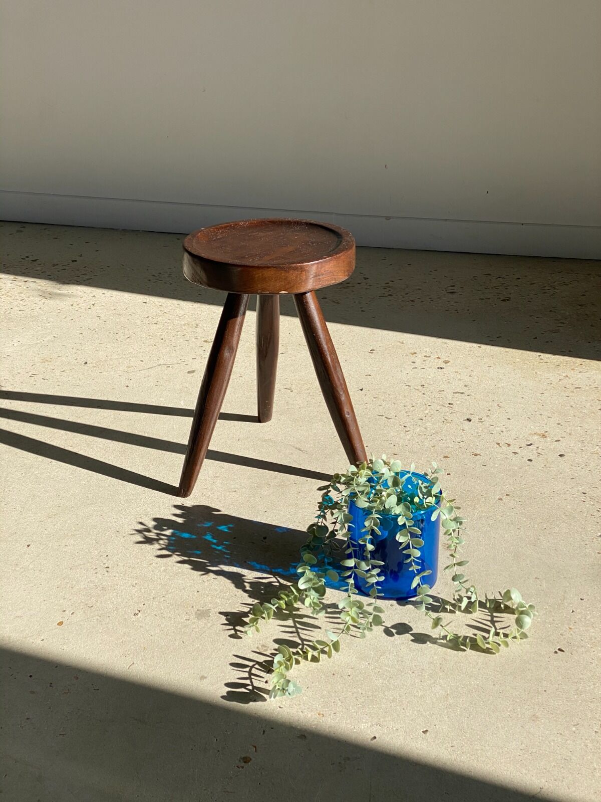 Brown solid wood stool seated circular dug