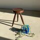 Brown solid wood stool seated circular dug