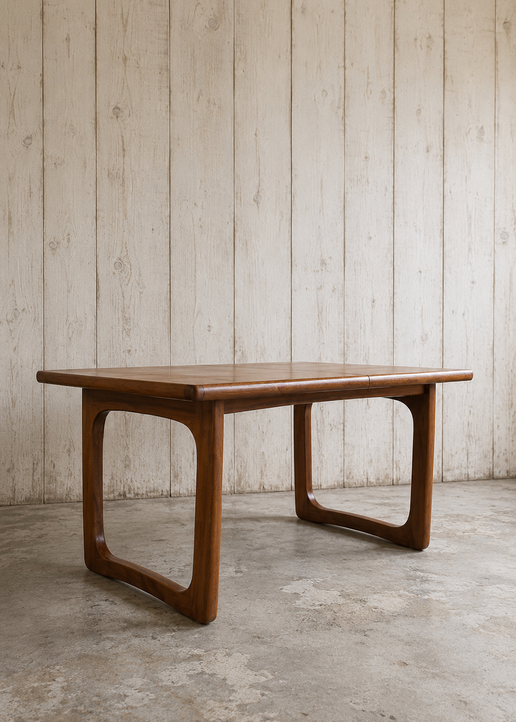 Extendable teak table, sled leg