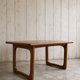 Extendable teak table, sled leg