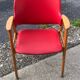 Chaise de bureau rouge en faux cuir et bois, style Milieu du Siècle (1960s)
