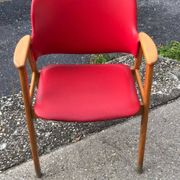 Red office chair in faux leather and wood, Mid-Century style (1960s)