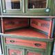 Hand-painted and signed notched cabinet