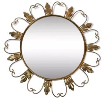 50s “witch’s eye” sun mirror. deknudt hollywood regency