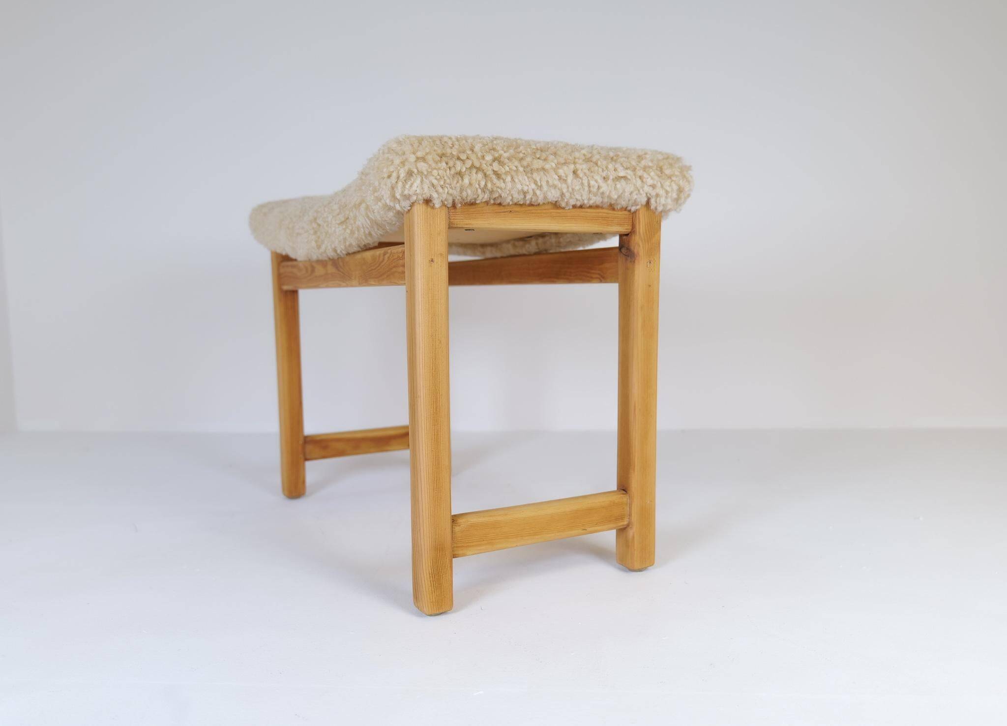 Modern Scandinavian stool in pine and sheepskin, Sweden, 1970s