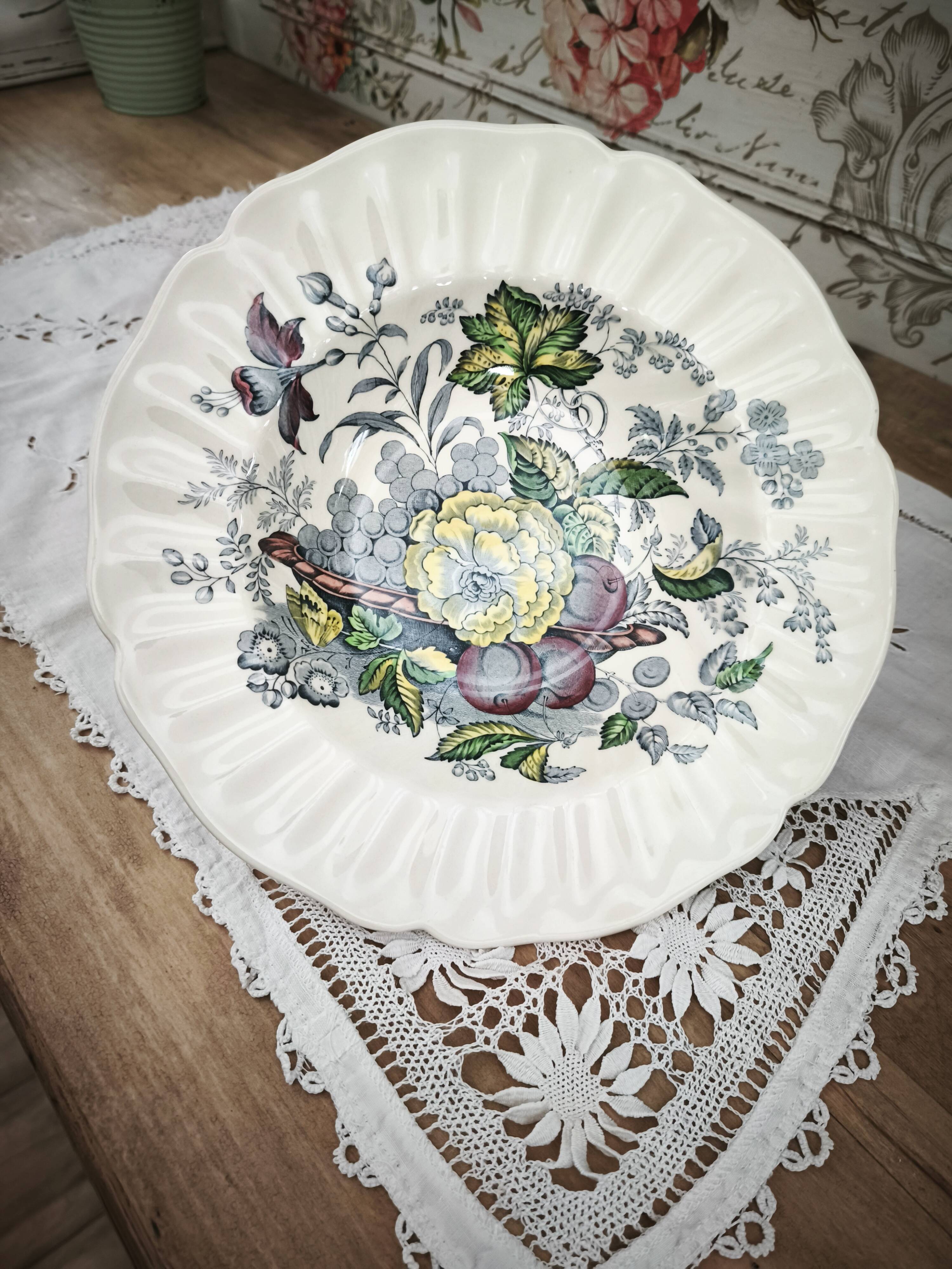Set of 6 Royal Doulton deep plates in the Kirkwood pattern.