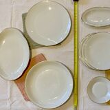 Vintage table service Limoges porcelain white with gold trim.