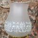 Pair of bronze wall lamps and frosted glass globe, early twentieth century.