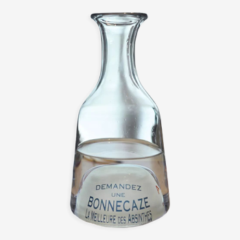 Magnifier advertising decanter