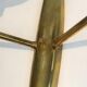Pair of bronze wall sconces with worked glass reflectors. Stilnovo