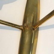 Pair of bronze wall sconces with worked glass reflectors. Stilnovo