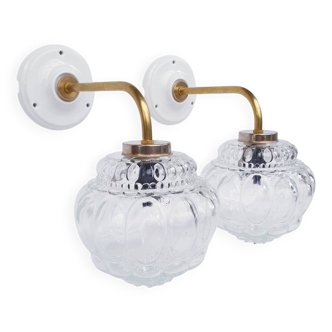 Pair of vintage wall sconces in molded glass and brass