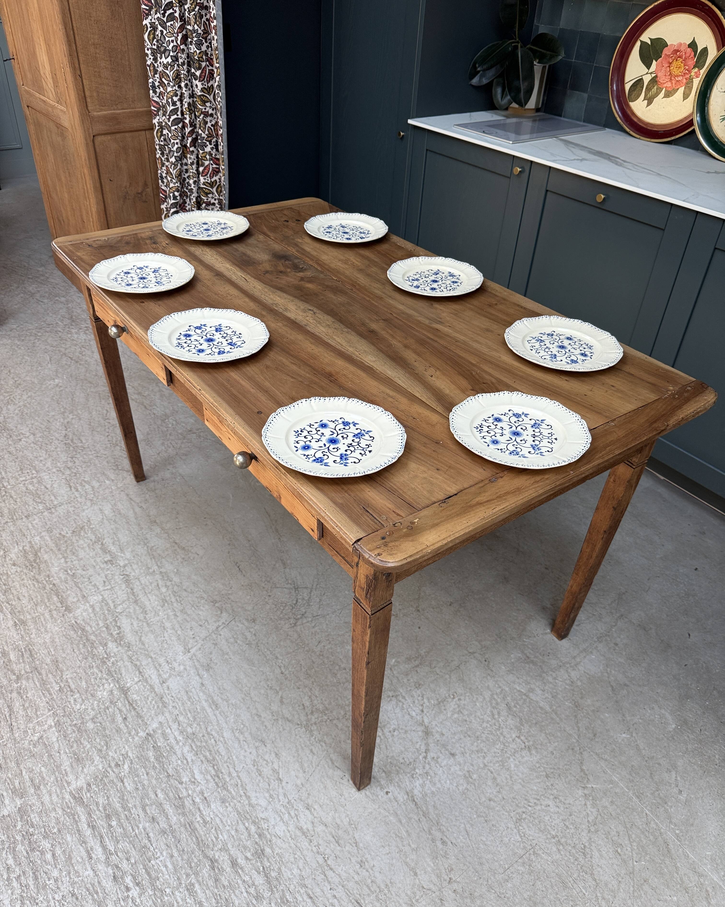 Renovated oak and walnut farmhouse table.