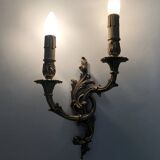 Vintage pair of double wall sconces in bronze from the 1960s.