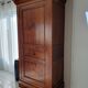 Man standing in cherry wood perfect condition like new