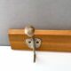 Wooden wall coat holder from the 1950s