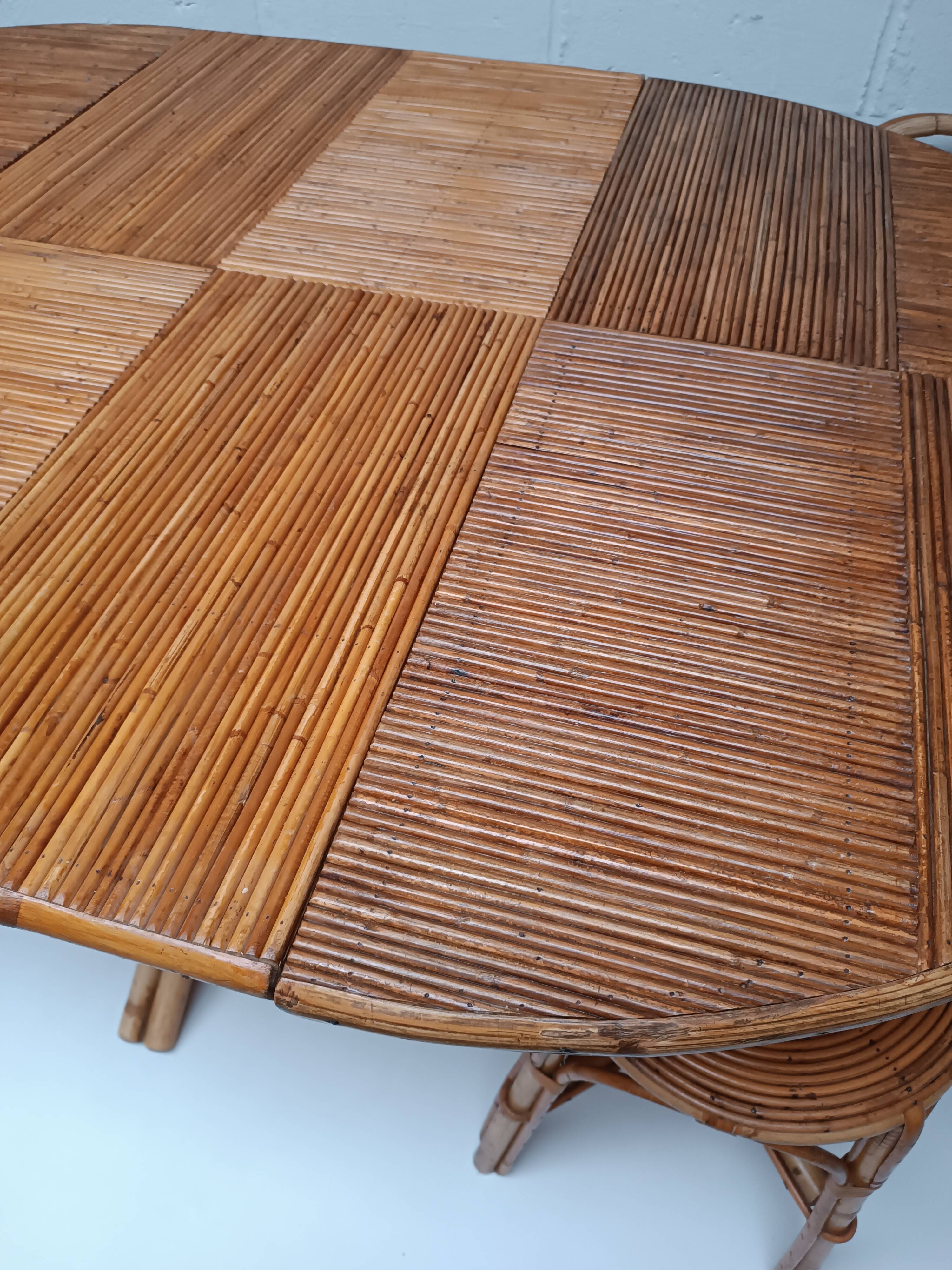 Bamboo table with extensions, 3 chairs and 3 stools from the 1960s.