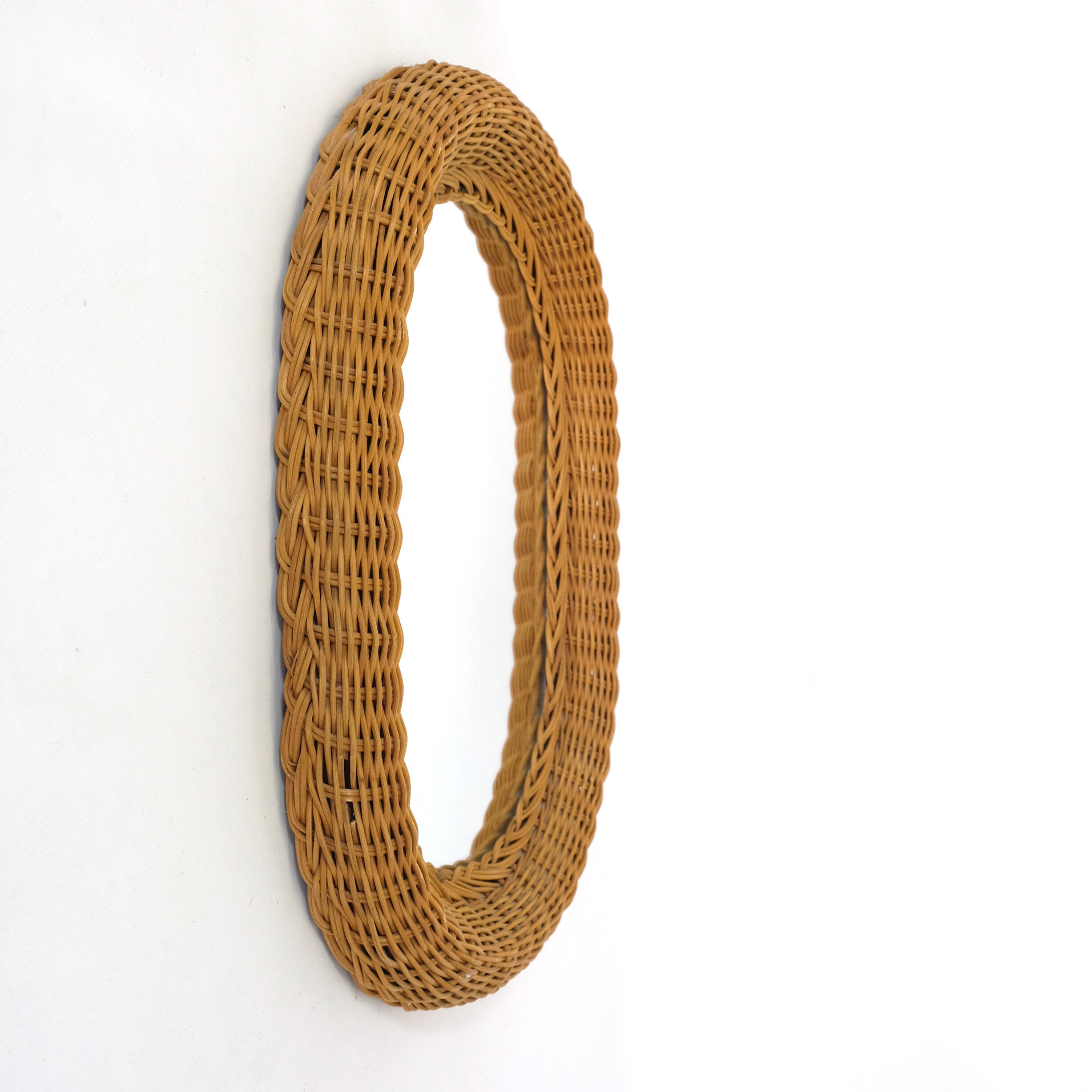 Mirror with thick wicker frame, 54x38 cm.