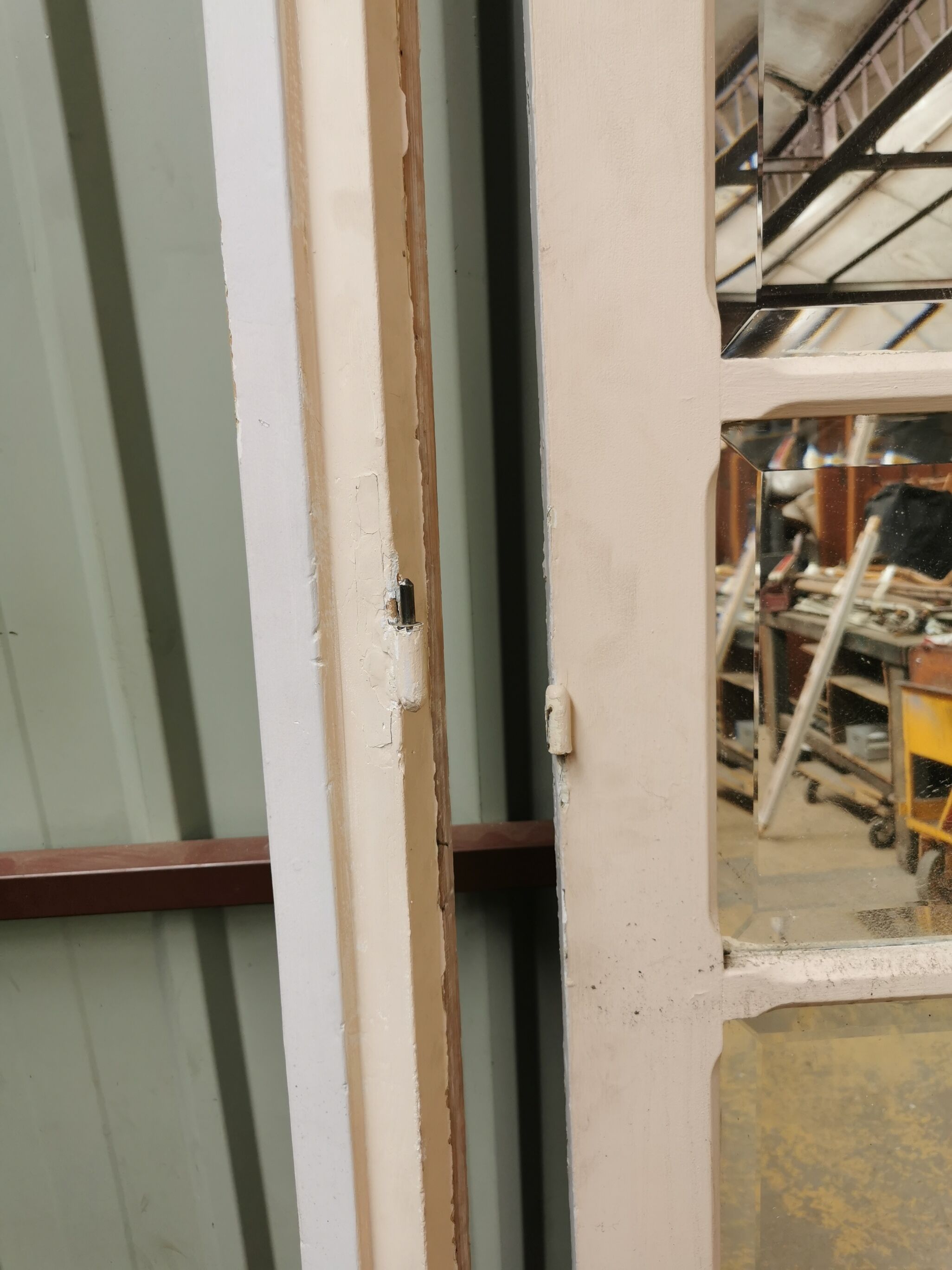 Pair of old haussmannian doors with bevelled mirrors