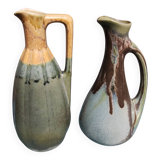 Two enameled stoneware pitchers
