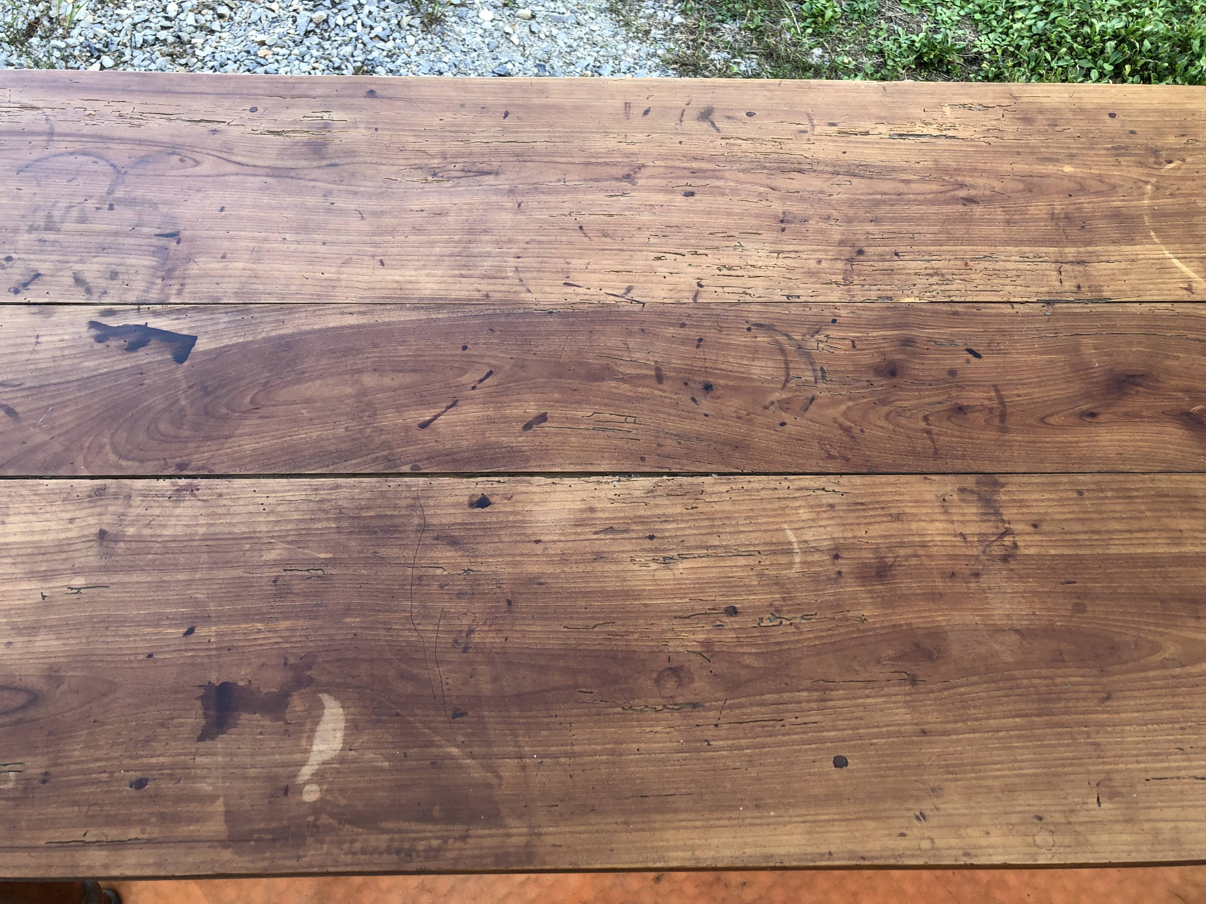 Antique cherry wood farm table with turned base with 2 drawers and 1 pull