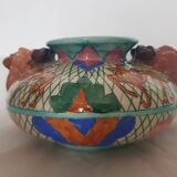 Vase with flattened body with mascarons Attributed to Monaco
