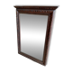 Large bevelled mirror with a carved wooden frame