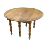 Old solid oak round table, diameter 115cm 6 feet on wheels