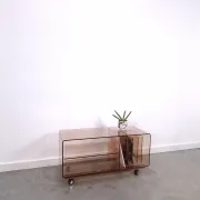 Vintage hifi, LP cabinet, TV unit made of tinted plexiglass on wheels, records.