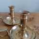 Duo of gilded brass cellar rat candlesticks