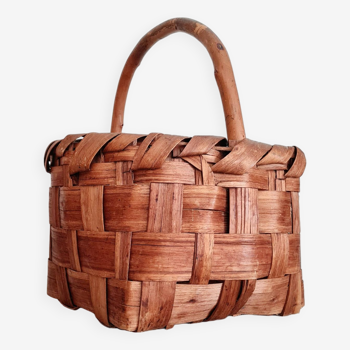 Old basket in wood and natural fibers