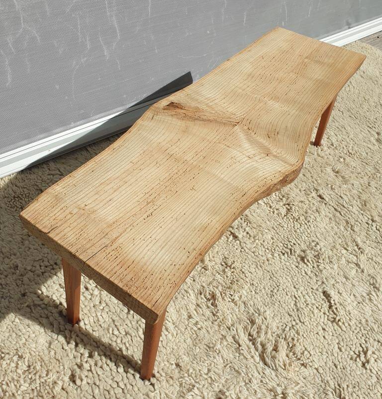 Raw design coffee table with compass legs