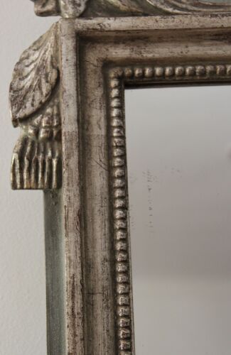 Miroir en bois sculpté Louis XVI - doré à la feuille d'argent