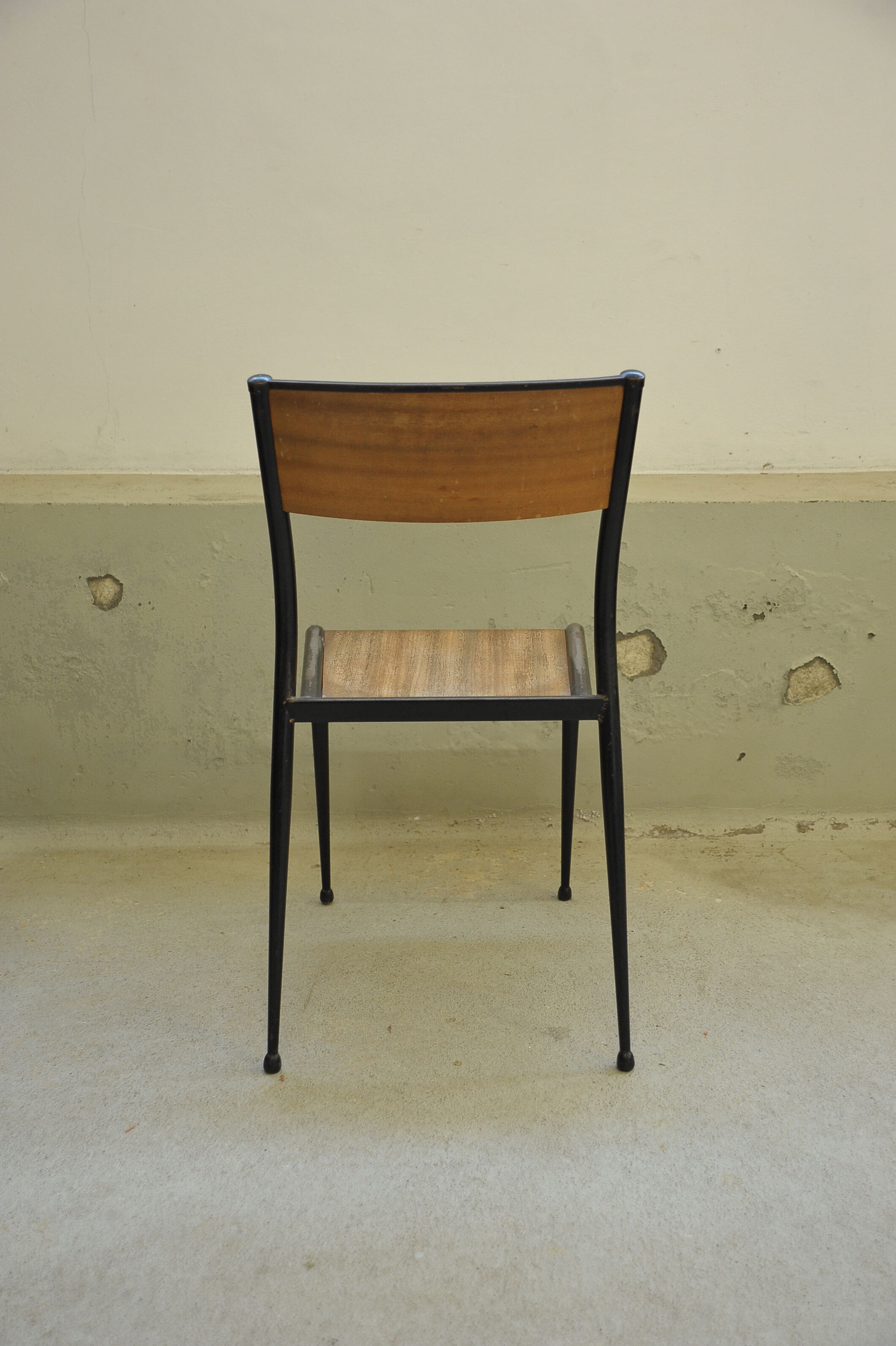 Series of 6 black Mullca school chairs