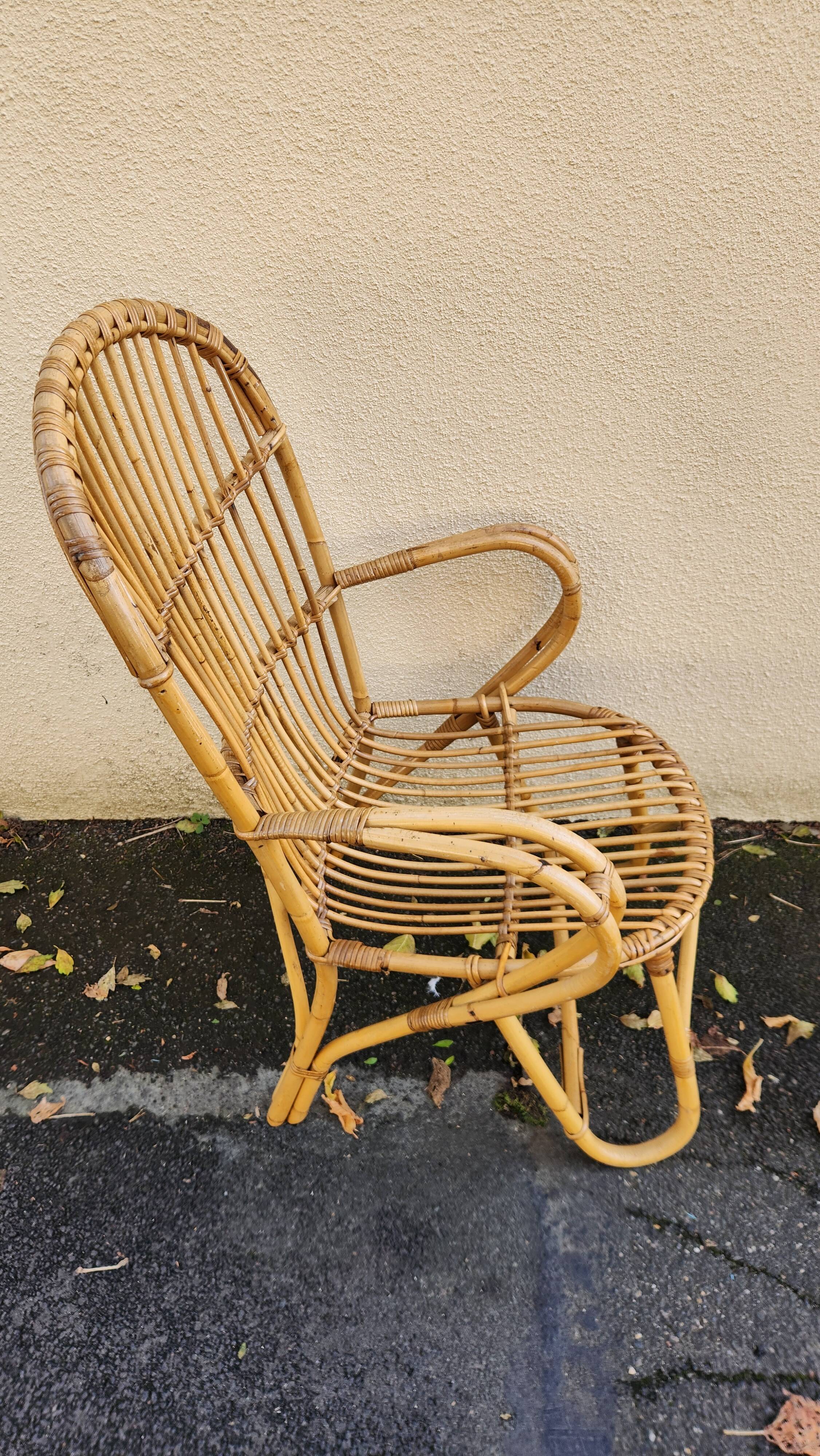 Antique wicker and rattan armchair