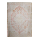 Tapis de salon persan rouge pâle