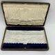 Service of 12 silver-plated metal coffee spoons with tongs and box from around 1900.