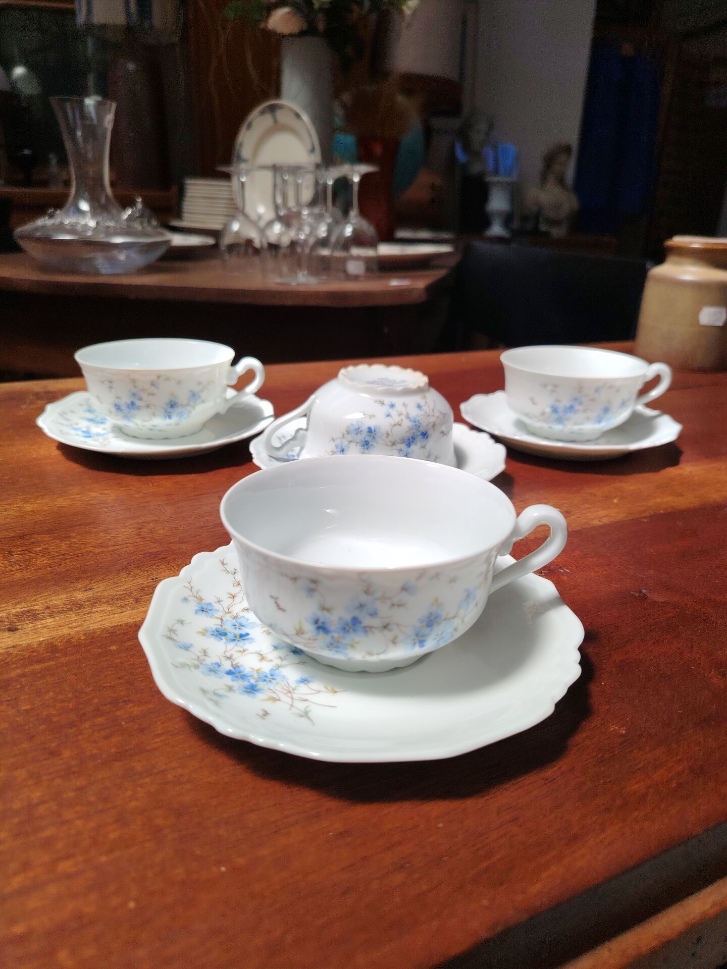 Set of 4 Limoges porcelain cups and saucers.