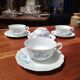 Set of 4 Limoges porcelain cups and saucers.
