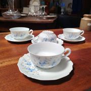 Set of 4 Limoges porcelain cups and saucers.